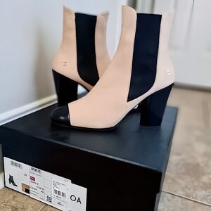 CHANEL Black and Cream Heeled Boots